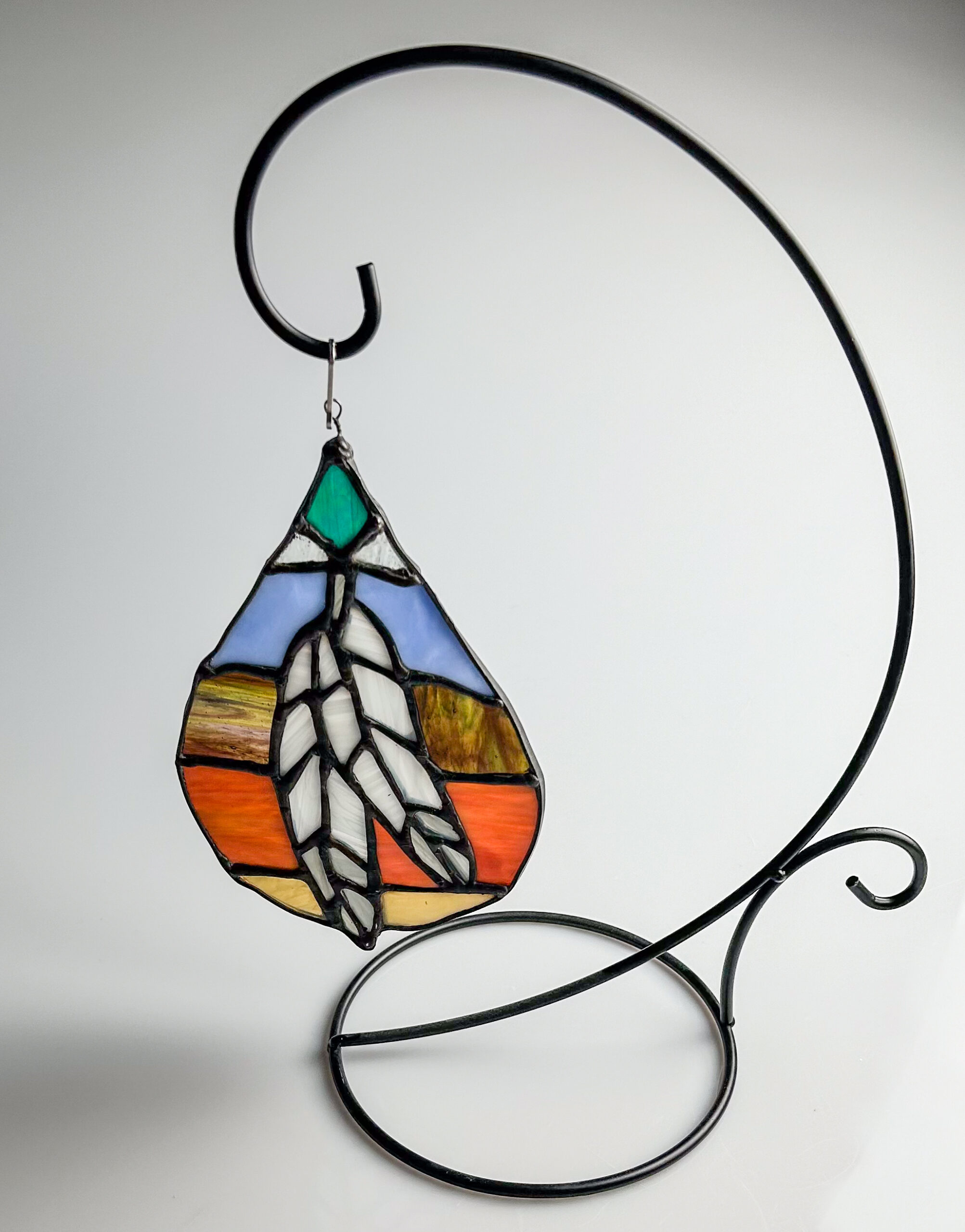 You are currently viewing Indian Feather Stained Glass